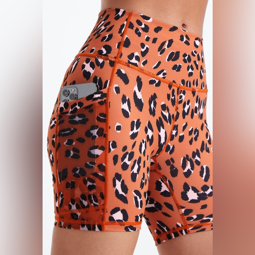 Fabletics orange leopard print on the go 6” short